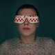 Eleven wears a mask made from a pizza box in Stranger Things season 4.